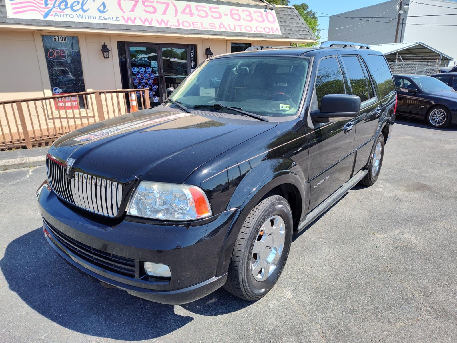 2006 Black /tan Lincoln Navigator 4WD Luxury (5LMFU28546L) with an 5.4L V8 SOHC 24V engine, 6-Speed Automatic Overdrive transmission, located at 5700 Curlew Drive, Norfolk, VA, 23502, (757) 455-6330, 36.841885, -76.209412 - Photo #5